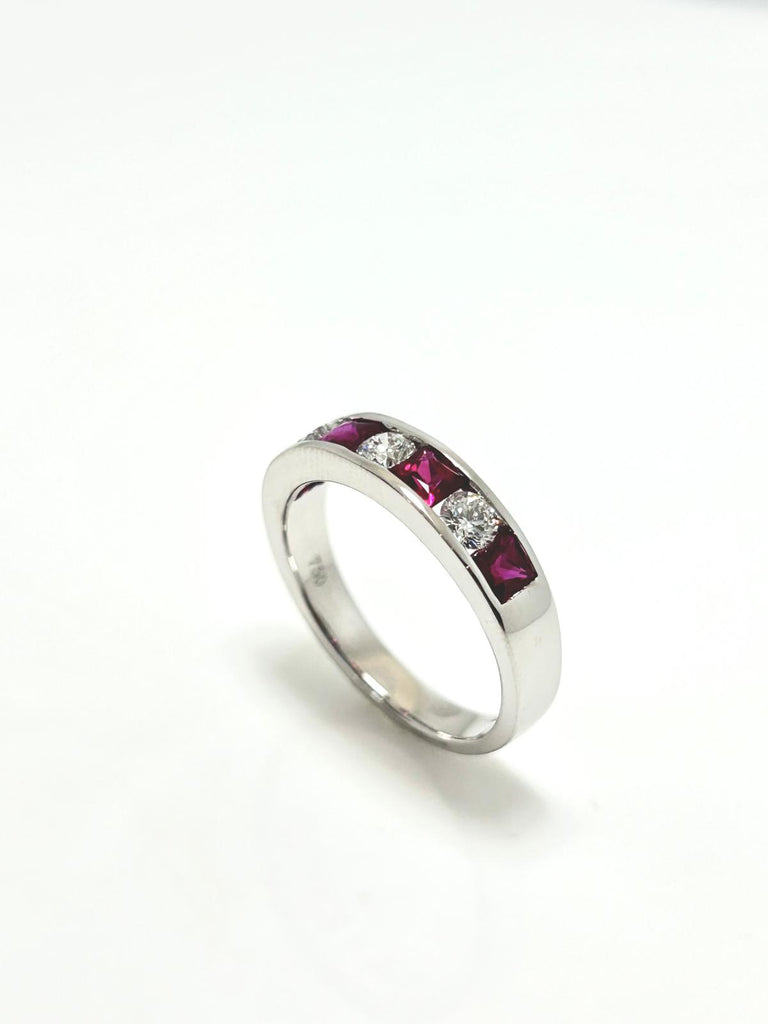 18CT WHITE GOLD 1.04CT RUBY AND 50PT DIAMOND ETERNITY RING