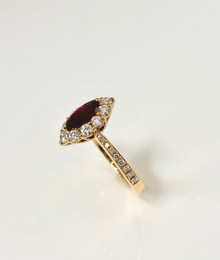 18CT DIAMOND 66PT AND RUBY 77PT HALO RING