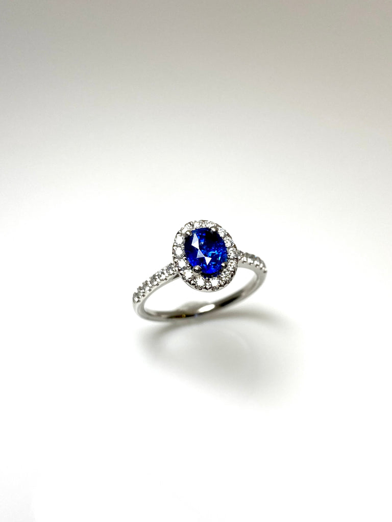 PLATINUM 1.13CT SAPPHIRE WITH 35PT DIAMOND HALO AND SHOULDERS