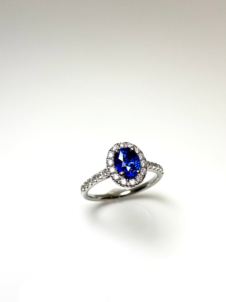 PLATINUM 1.13CT SAPPHIRE WITH 35PT DIAMOND HALO AND SHOULDERS