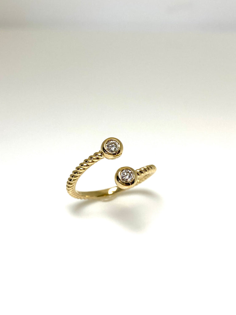 18CT YELLOW GOLD OPEN TWIST RING WITH 17PT DIAMONDS