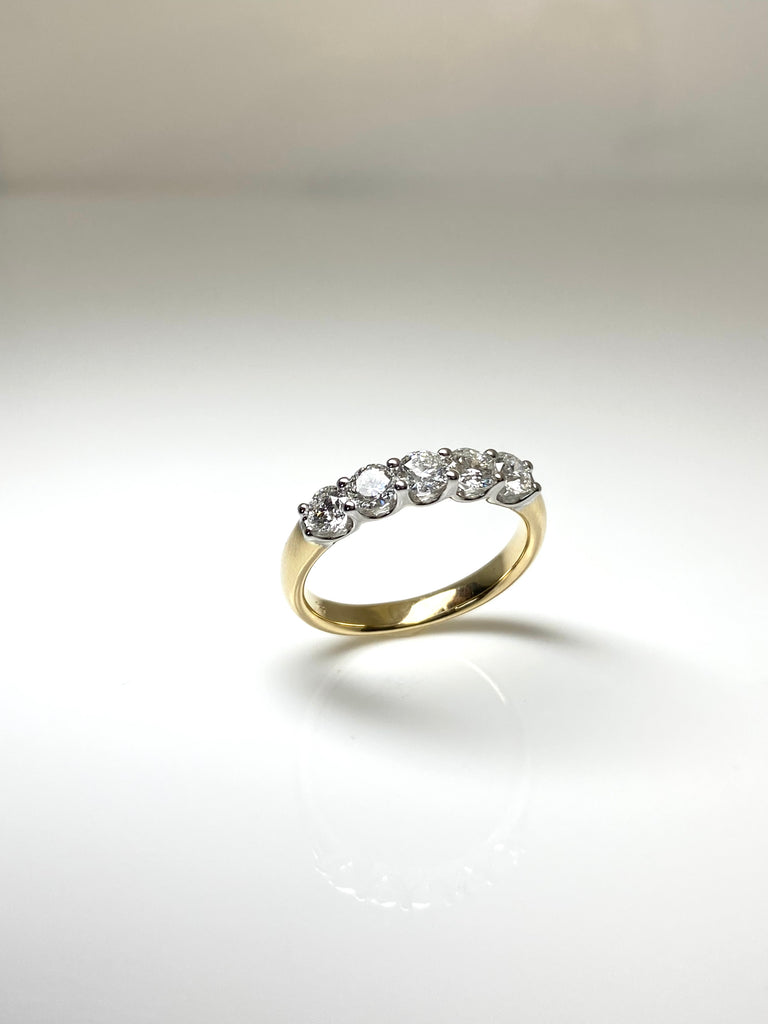 18CT YELLOW AND WHITE GOLD 89PT ETERNITY RING