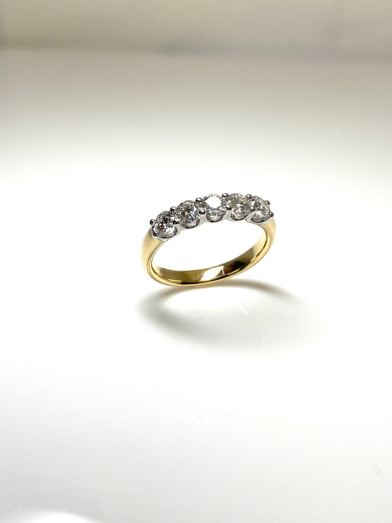 18CT YELLOW AND WHITE GOLD 89PT ETERNITY RING