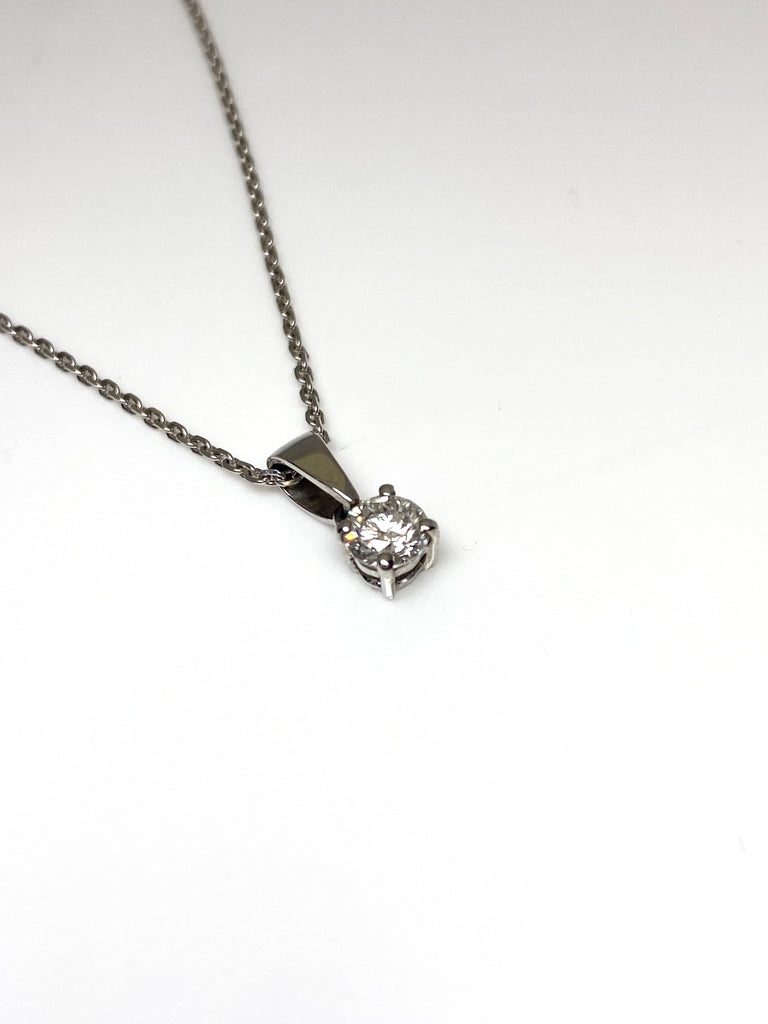 18CT 42PT DIAMOND SOLITAIRE PENDANT AND 9CT CHAIN