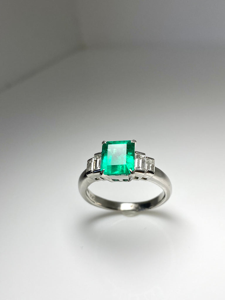 2.03CT COLUMBIAN EMERALD AND 75PT BAGUETTE DIAMOND PLATINUM RING