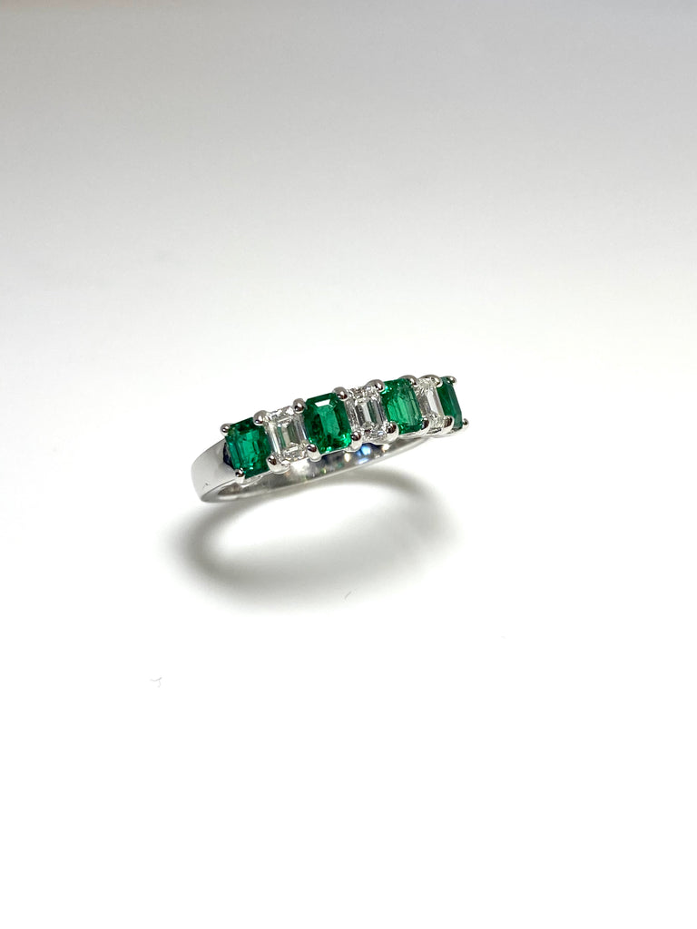 PLATINUM DIAMOND AND EMERALD ETERNITY BAND