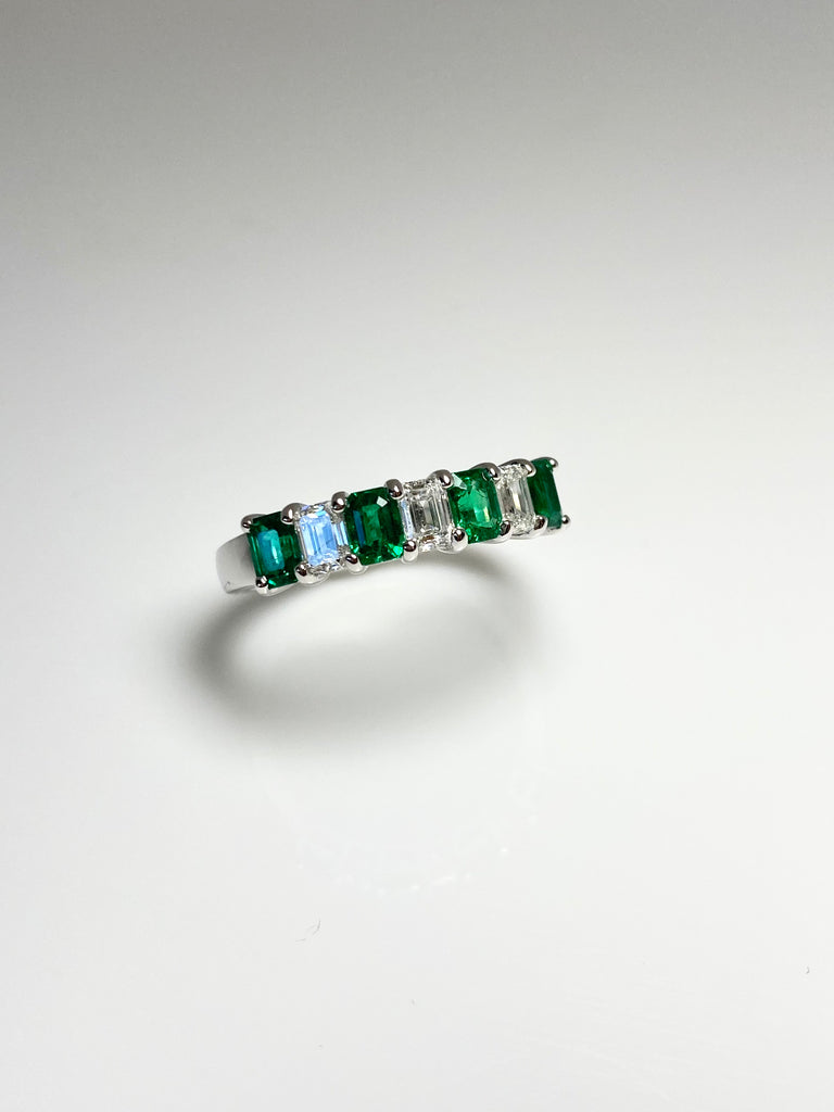 PLATINUM DIAMOND AND EMERALD ETERNITY BAND