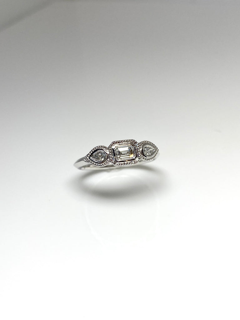 PLATINUM 56PT 3 STONE DIAMOND RING