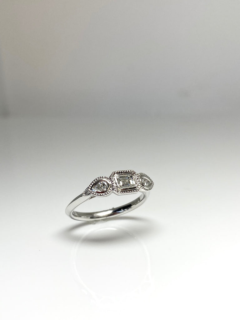 PLATINUM 56PT 3 STONE DIAMOND RING