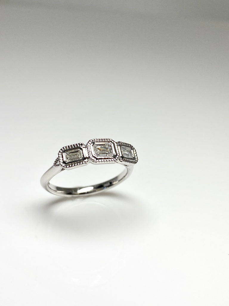 PLATINUM 88PT 3 STONE DIAMOND RING