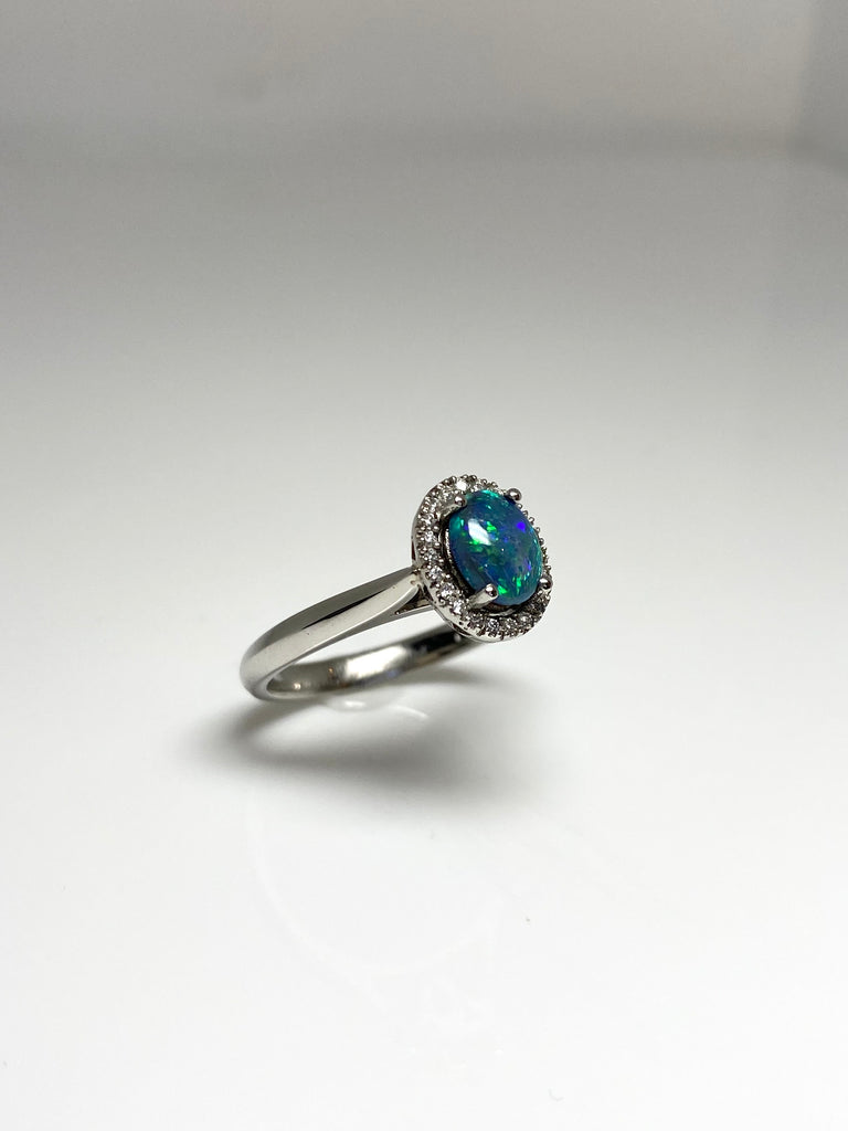 PLATINUM 80PT BLACK OPAL HALO RING