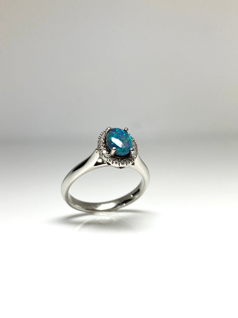 PLATINUM 80PT BLACK OPAL HALO RING