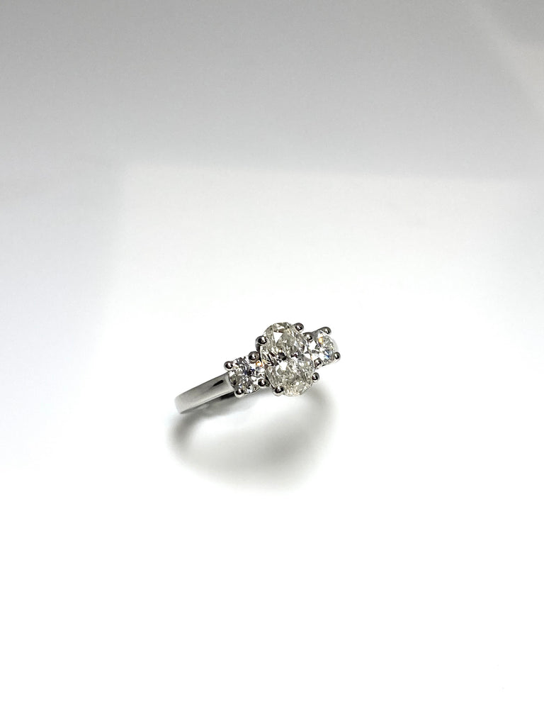 PLATINUM 1.50CT OVAL DIAMOND TRILOGY RING