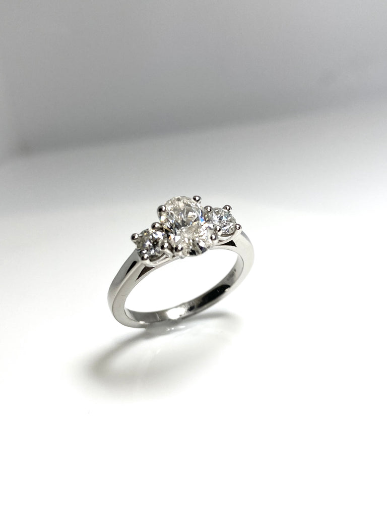 PLATINUM 1.50CT OVAL DIAMOND TRILOGY RING