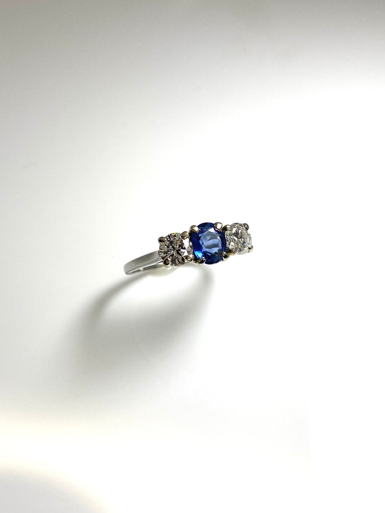 18CT WHITE GOLD 3 STONE SAPPHIRE AND DIAMOND RING