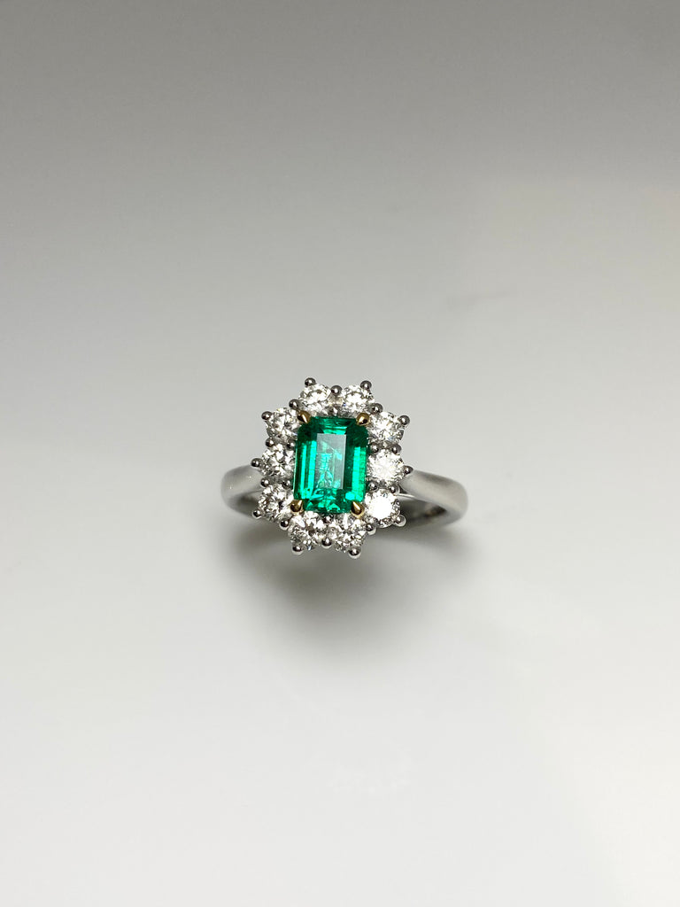 18CT EMERALD CUT EMERALD DIAMOND CLUSTER RING