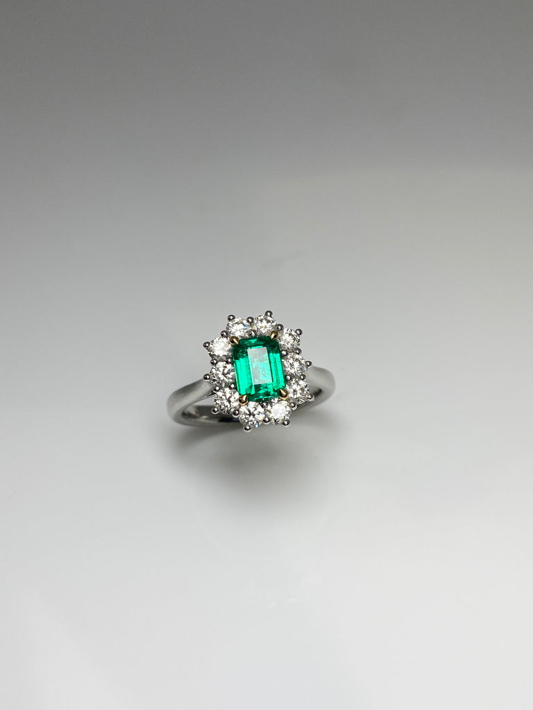 18CT EMERALD CUT EMERALD DIAMOND CLUSTER RING