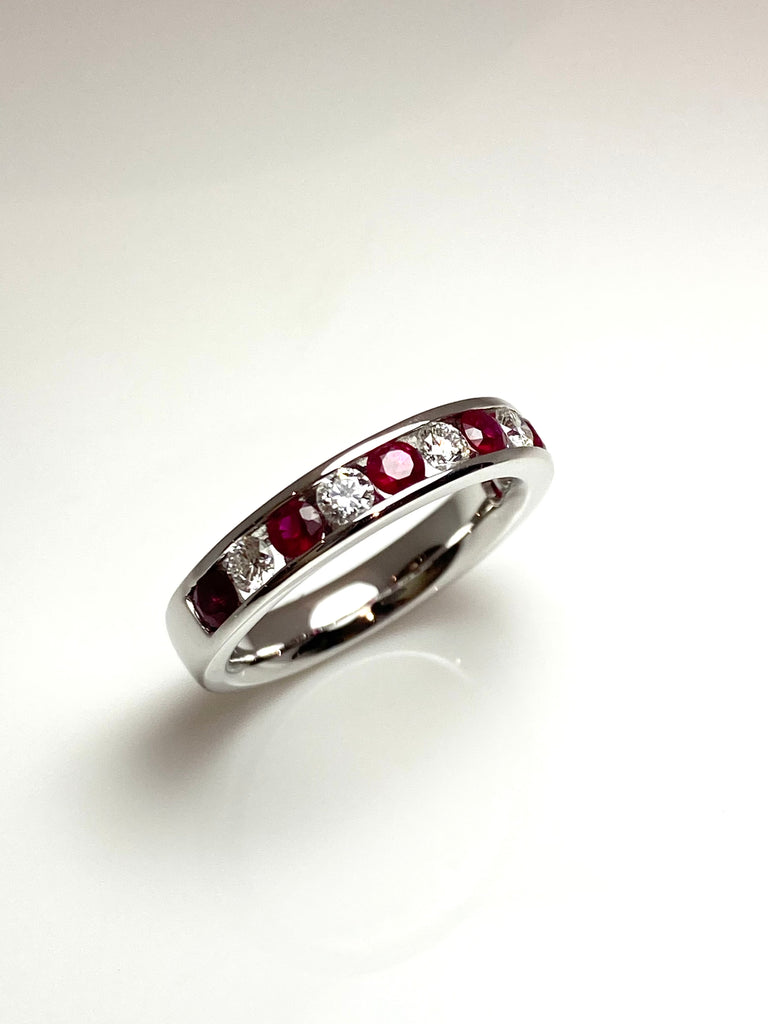 18CT WHITE GOLD 64PT RUBY AND 41PT DIAMOND ETERNITY RING