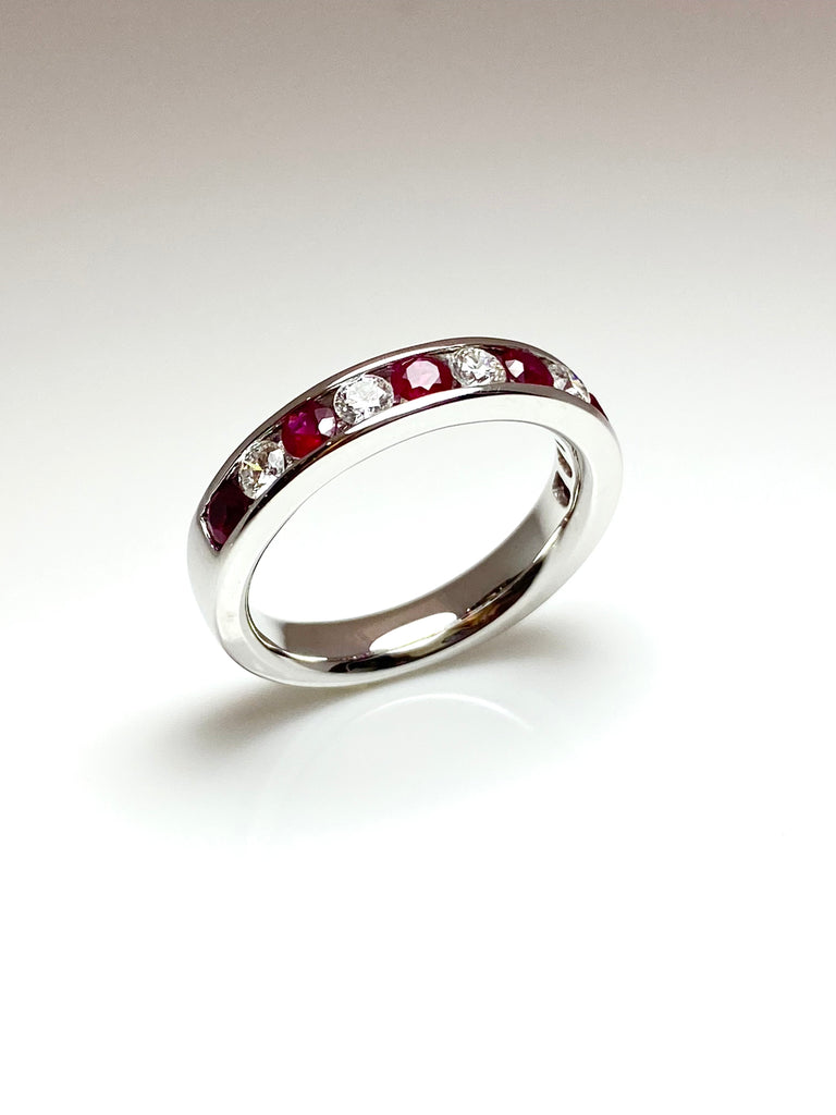 18CT WHITE GOLD 64PT RUBY AND 41PT DIAMOND ETERNITY RING