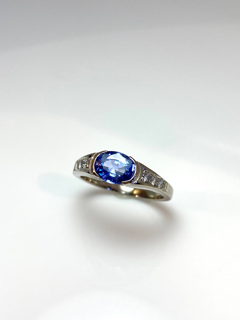 18CT WHITE GOLD 1.50CT SAPPHIRE AND DIAMOND DRESS RING