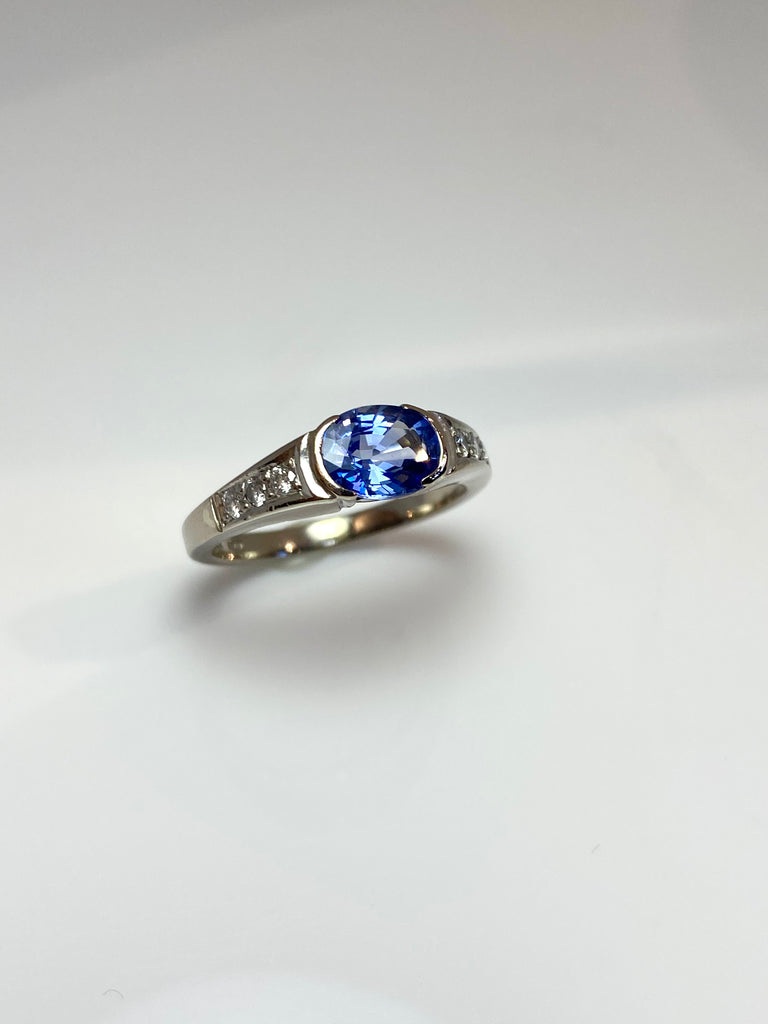 18CT WHITE GOLD 1.50CT SAPPHIRE AND DIAMOND DRESS RING