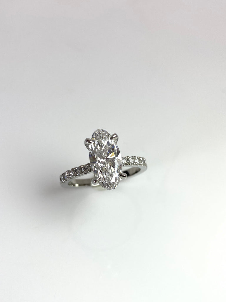 PLATINUM 2.11CT ELONGATED OVAL LAB GROWN DIAMOND RING WITH HIDDEN HALO