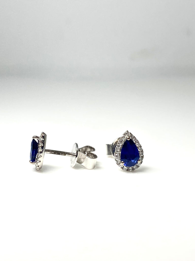 18CT WHITE GOLD 1.20CT ROYAL BLUE SAPPHIRE WITH DIAMOND HALO STUDS