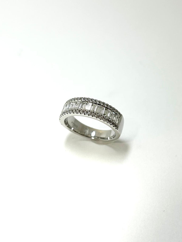 PLATINUM BAGUETTE AND ROUND BRILLIANT CUT DIAMOND ETERNITY RING